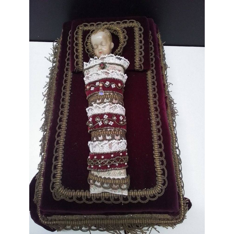  STATUETTE CIRE DE L\'ENFANT JÉSUS SUR UN COUSSIN