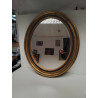 MIROIR OVALE BORD DORE