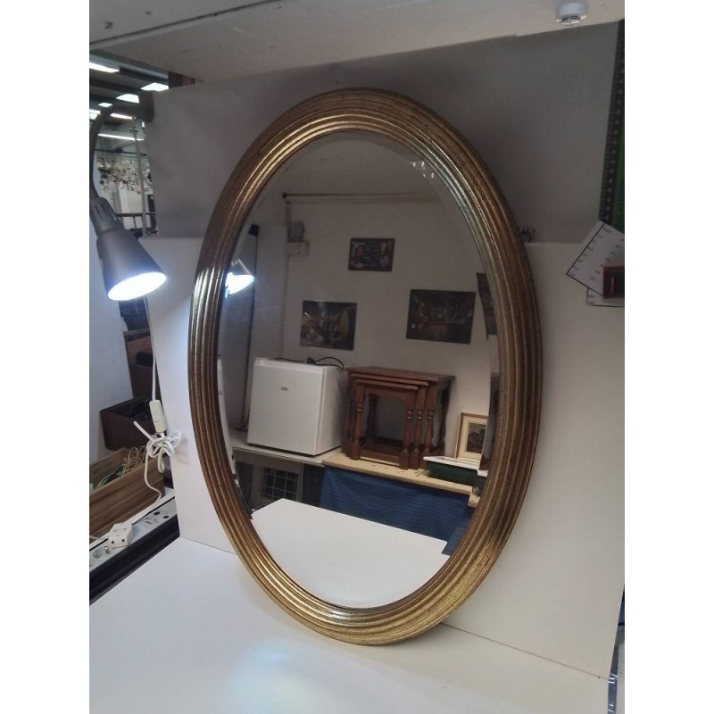MIROIR OVALE BORD DORE