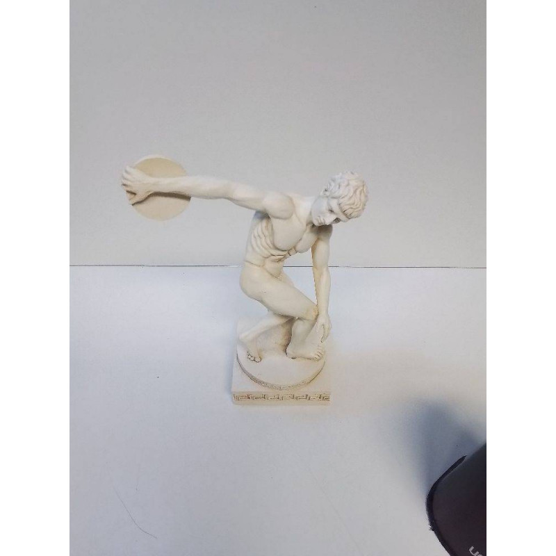 STATUETTE HOMME AVEC DISQUE 